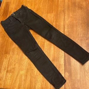 Black denim jeans Hollister zipper and bottom close size 1S w25 L26